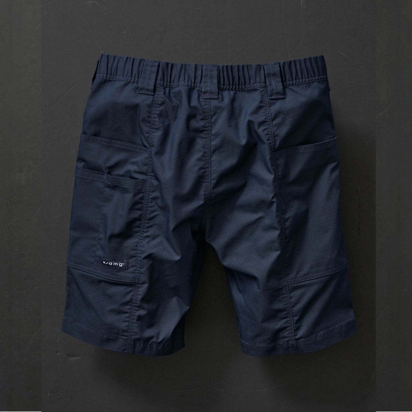 X-DMG US-4 ELASTIC WAIST TECH SHORT - NAVY