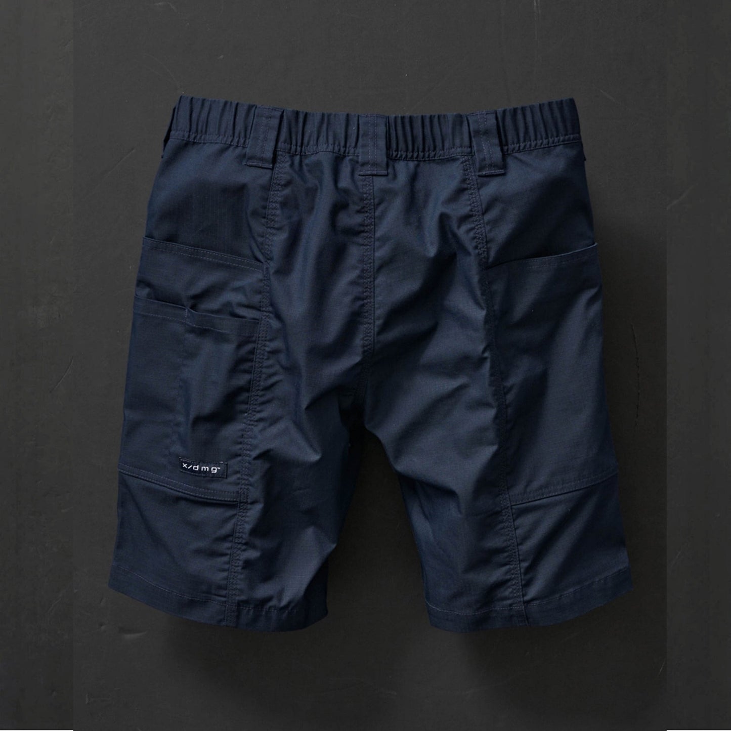X-DMG US-4 ELASTIC WAIST TECH SHORT - NAVY